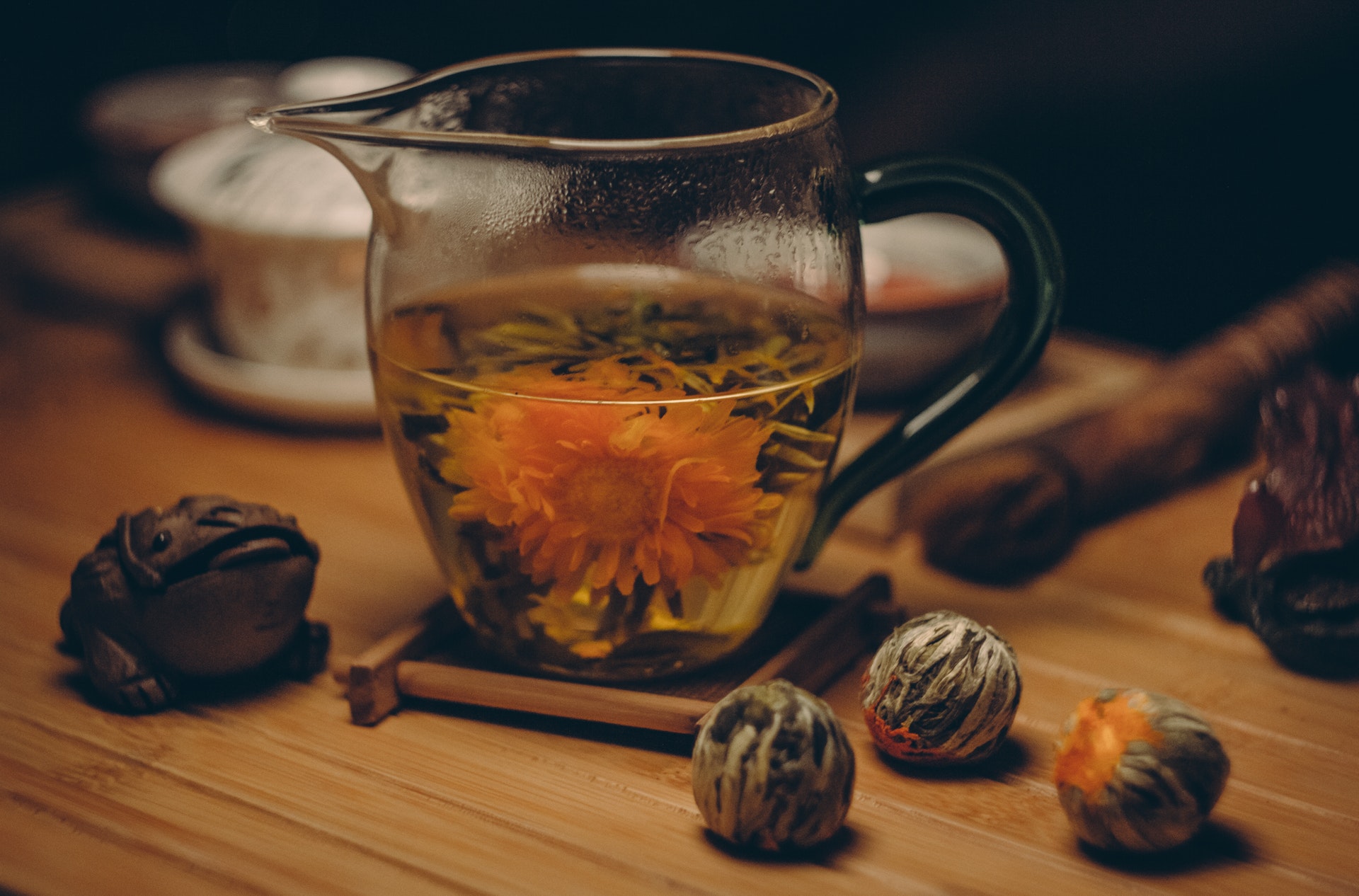 orange-petaled-flowers-in-clear-glass-pitcher-with-water-on-230489.jpg
